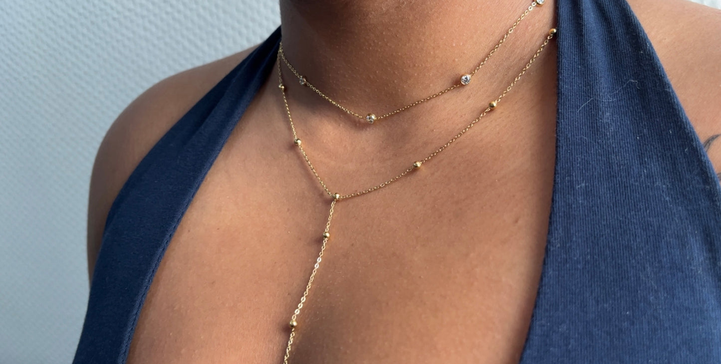 Collier cravate à perles