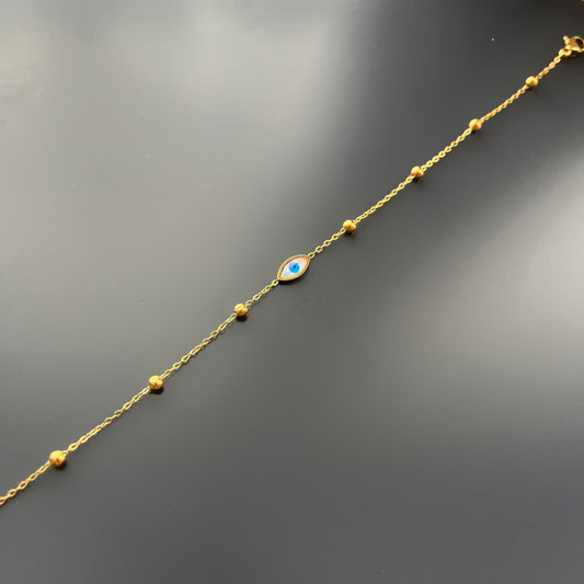 Chevillère oeil bleu et perles dorées