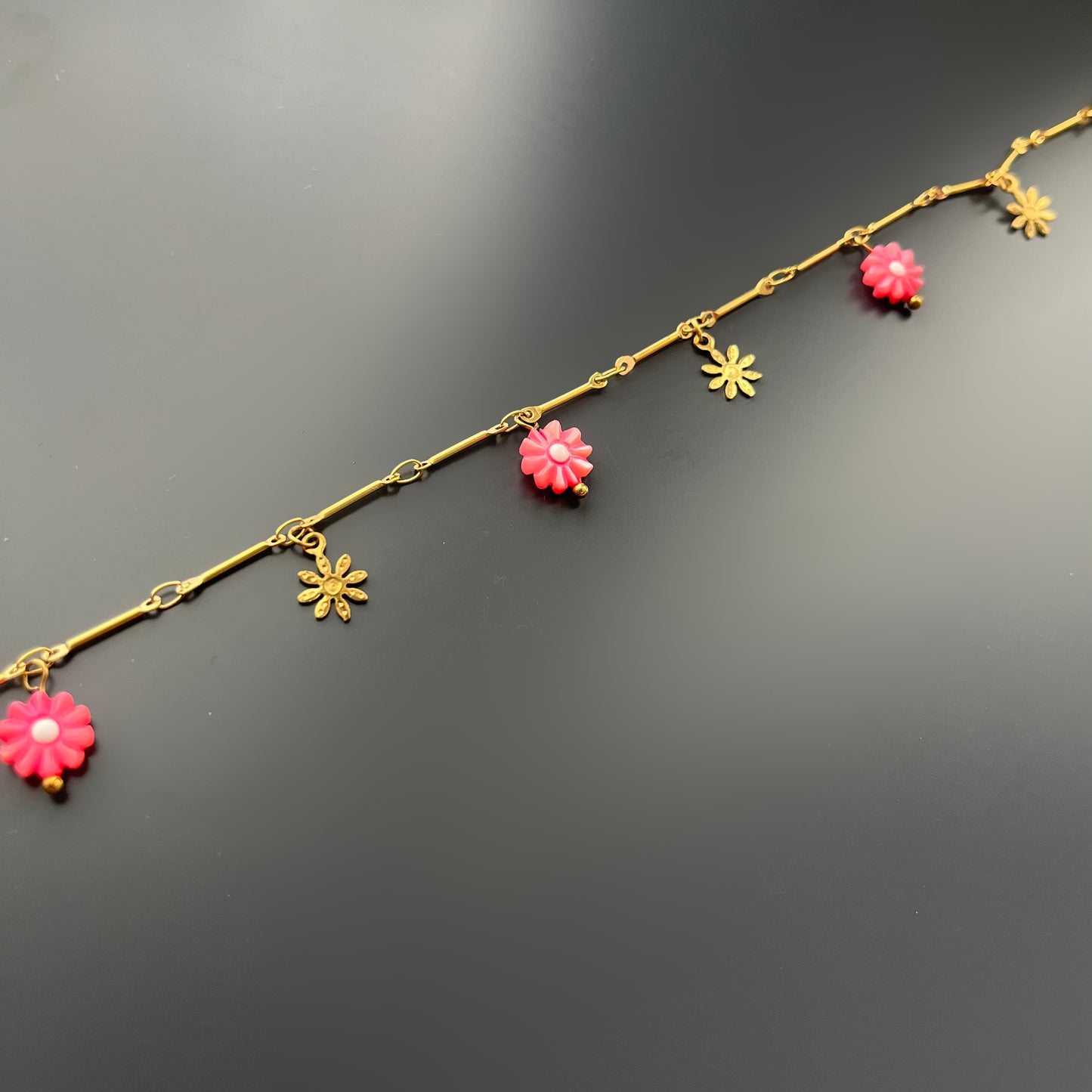 Chevillère fleurs roses