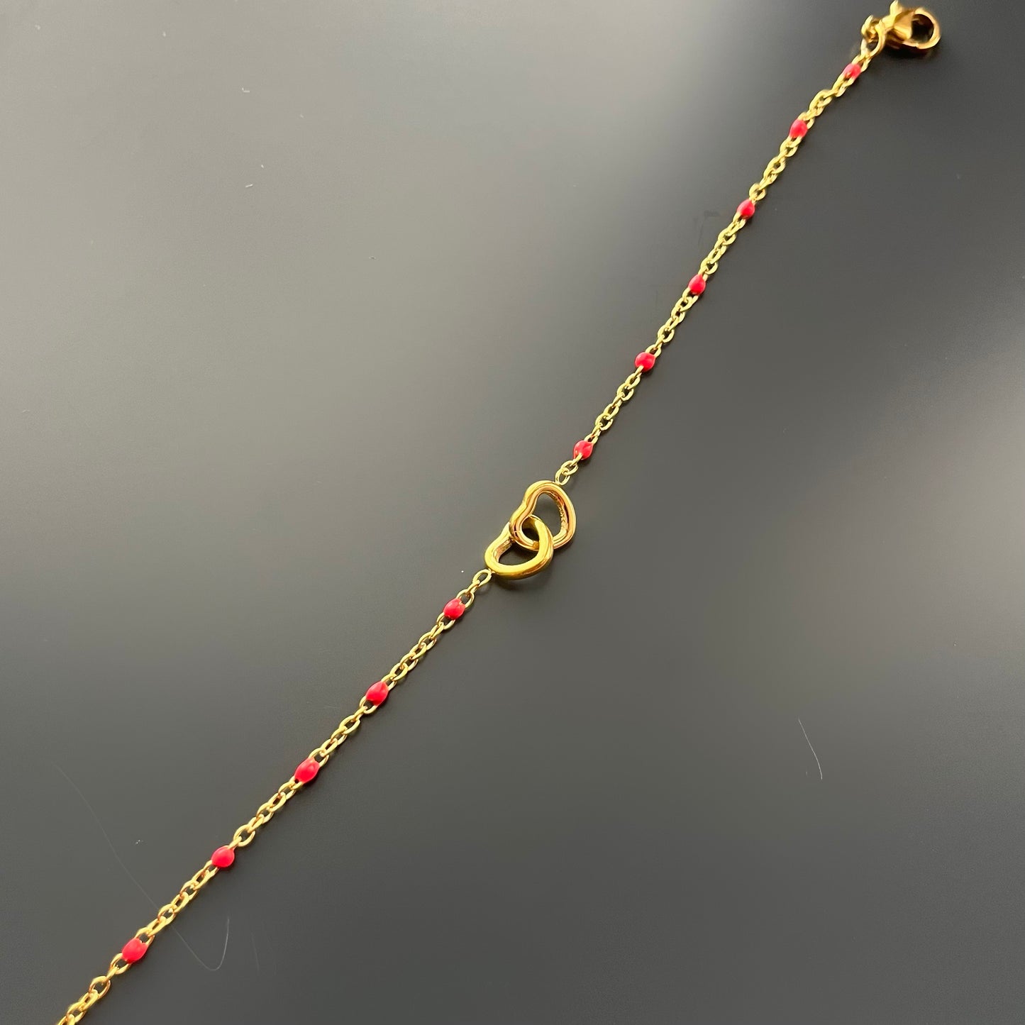 Bracelet double coeur avec perles roses