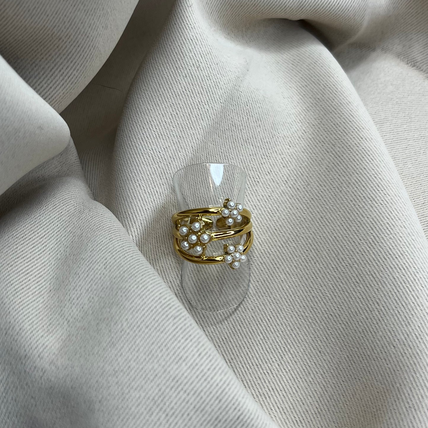 Bague triple rangs fleurs blanches