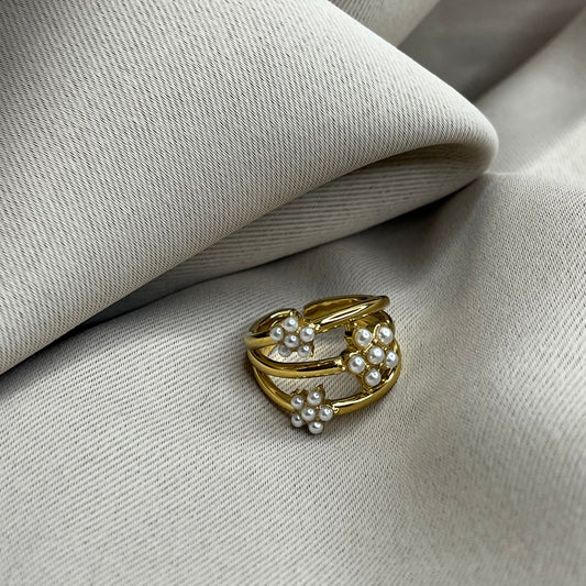 Bague triple rangs fleurs blanches